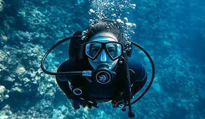 A woman scuba diving underwater